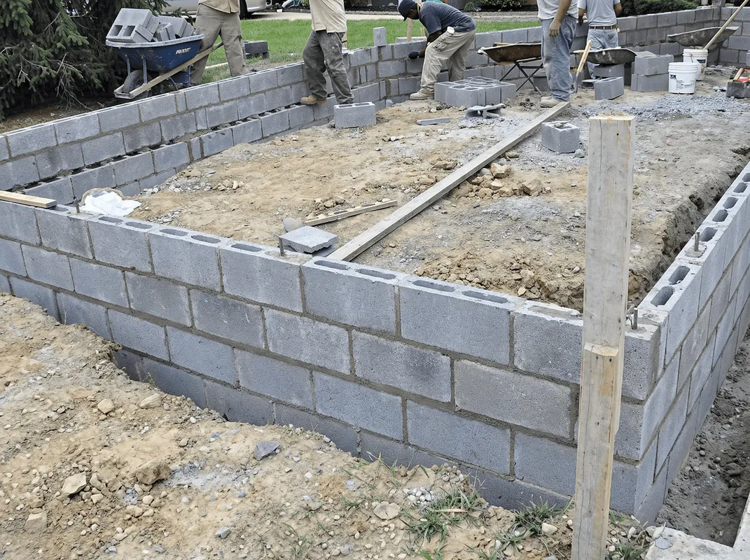 Professionals building a foundation with blocks in South Bend, IN